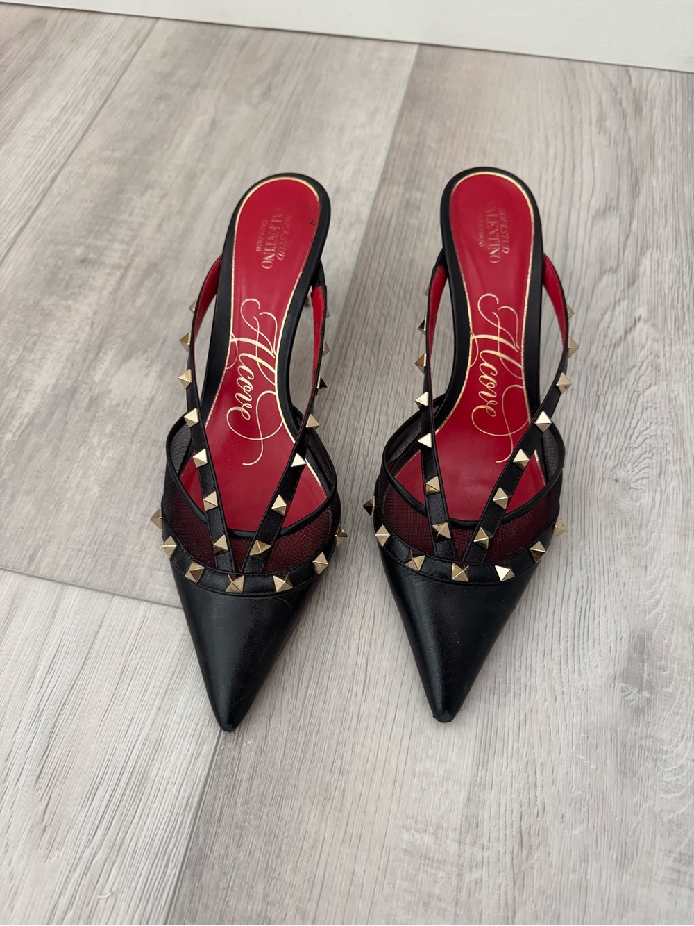 Valentino Black Pointed Rockstud Slingback Mules with Red Insole